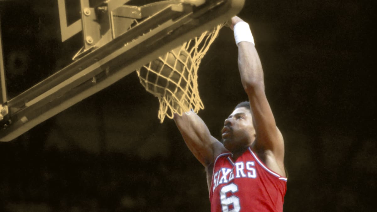Dr. J famous Rock the Baby Cradle Dunk against the Lakers