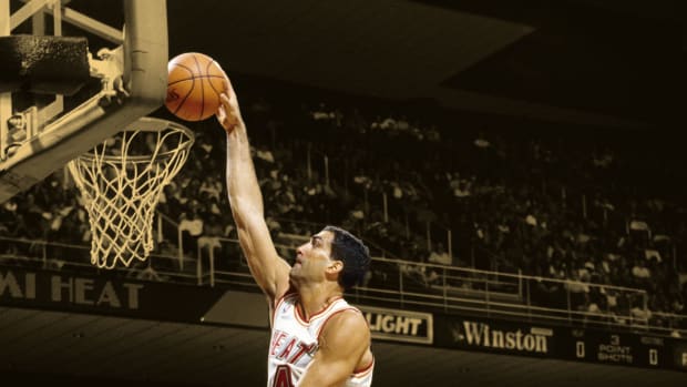 Miami Heat center Rony Seikaly dunks the ball at the Miami Arena during the 1994 season.