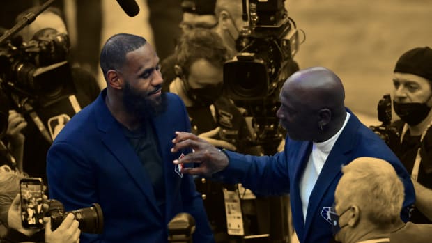 Lebron James and Michael Jordan on court during halftime during the 2022 NBA All-Star