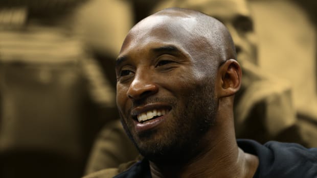 NBA great Kobe Bryant attends the semifinals of the women's Final Four in the 2018 NCAA Tournament