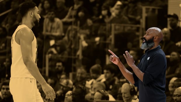 Brooklyn Nets head coach Jacque Vaughn talks to guard Ben Simmons