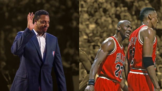 NBA great Paul Pierce is honored for being selected to the NBA 75th Anniversary Team during halftime in the 2022 NBA All-Star Game; Chicago Bulls guard Michael Jordan talks to forward Scottie Pippen