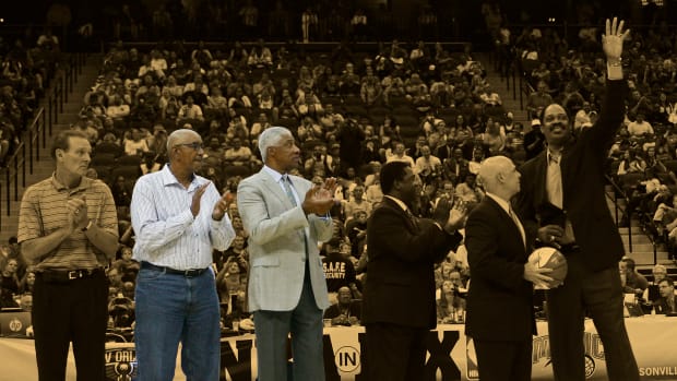 NBA legends George Gervin and Julius Erving at a ceremony for Artis Gilmore in 2013