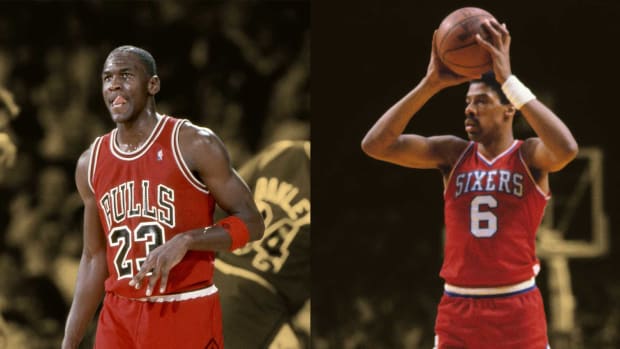 Michael jordan sales dunking on mutombo