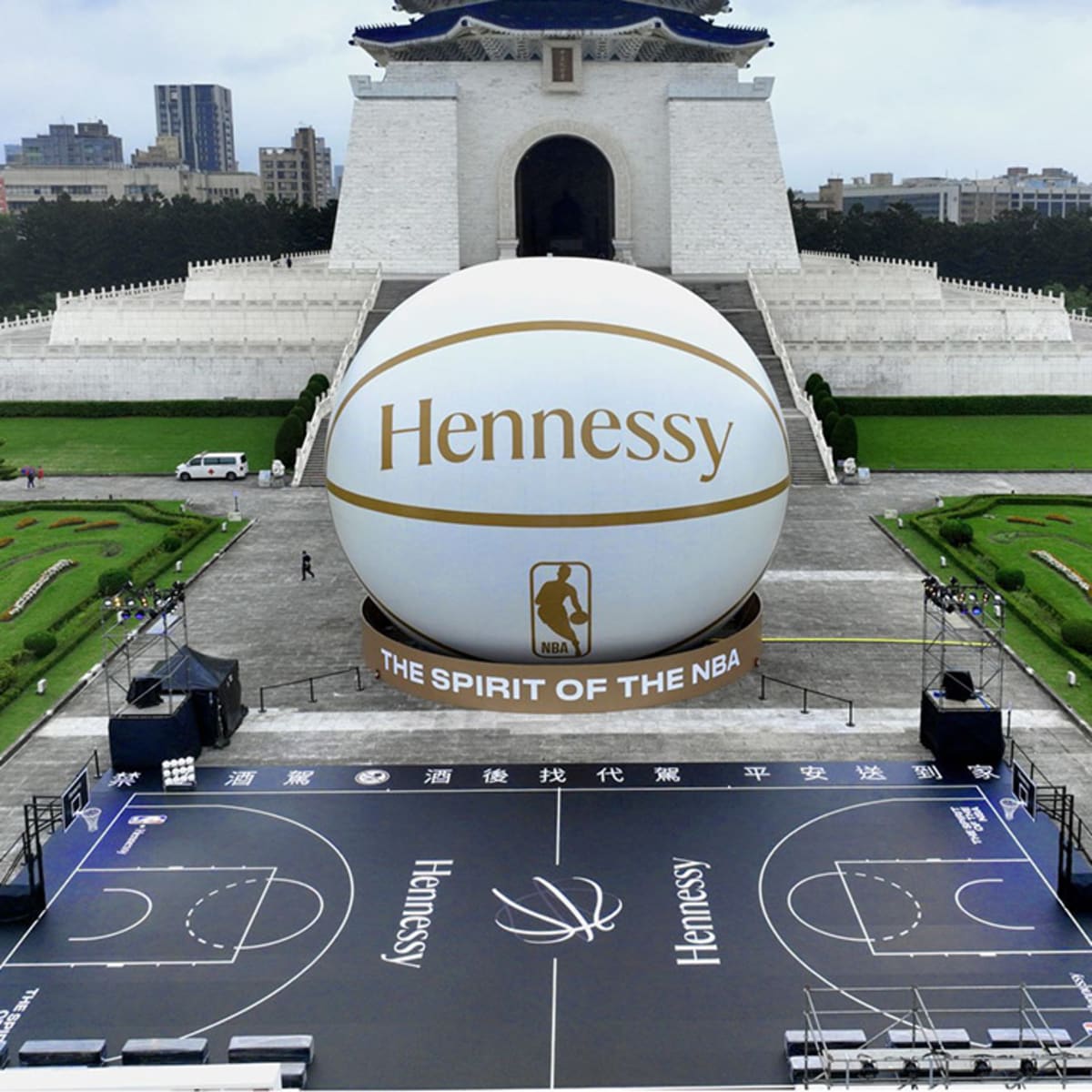 Hennessy x NBA float basketball court down the River Thames 