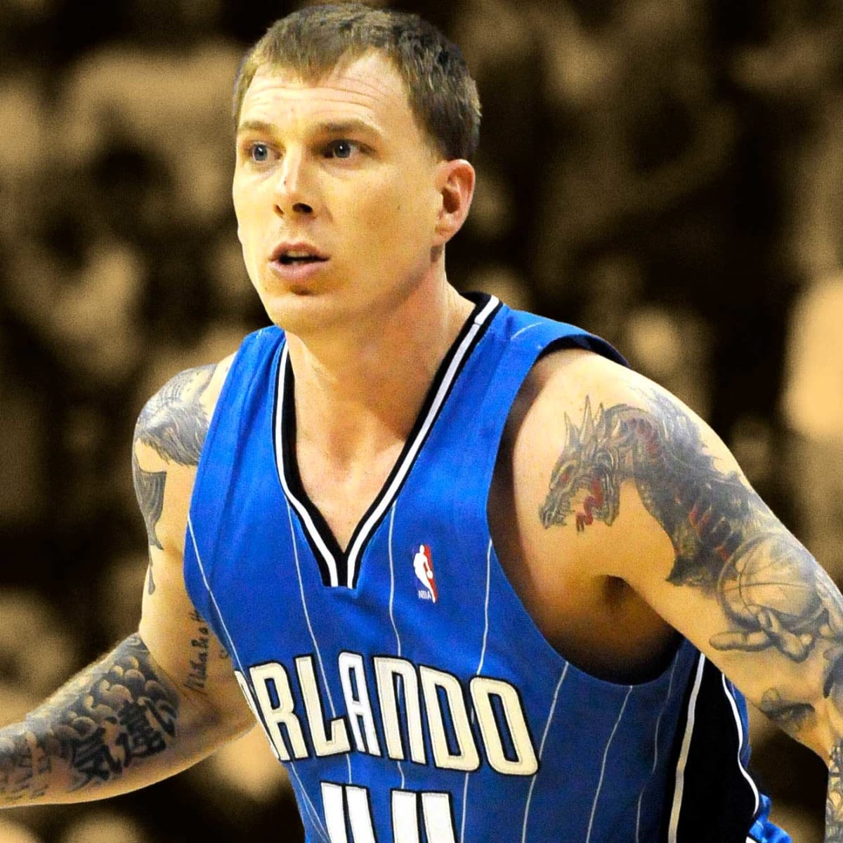 Miami Heat guard Jason Williams stares at an official after being