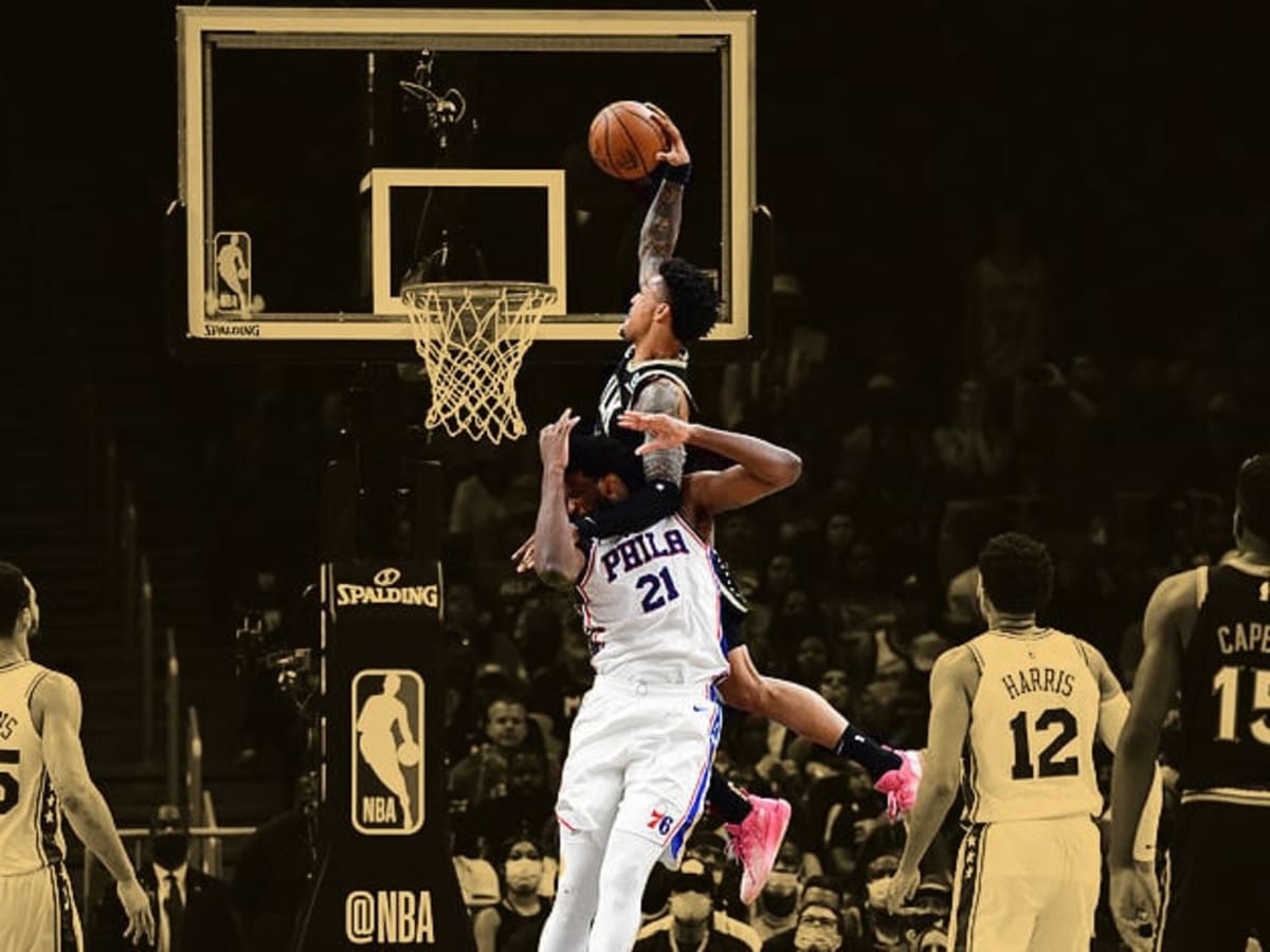 John Collins put Joel Embiid in a choke hold and dunked on him!”: NBA fans  react to the Hawks big man's emphatic lob dunk from Trae Young over the  Sixers MVP in
