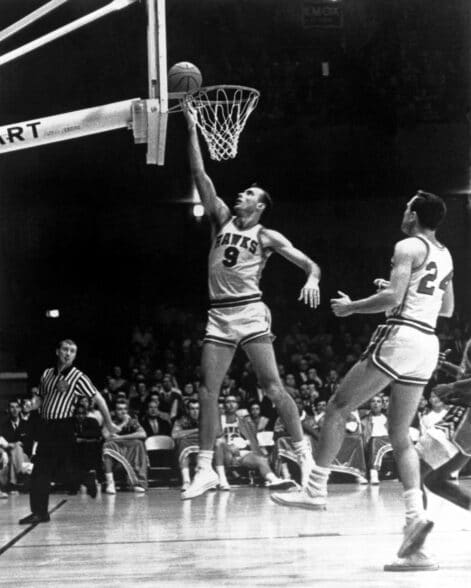 ST. LOUIS - 1955: Bob Pettit #9 of the St. Louis Hawks goes up for a layup during the NBA game at St. Louis, Missouri. NOTE TO USER: User expressly acknowledges and agrees that, by downloading and or using this photograph, User is consenting to the terms and conditions of the Getty Images License Agreement. Mandatory copyright notice: Copyright NBAE 2002 (Photo by NBA PHOTOS/ NBAE/ Getty Images)