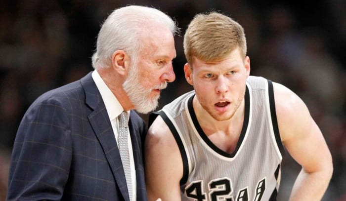 San Antonio Spurs head coach Gregg Popovich talks with Davis Bertans during second half action against the Utah Jazz Sunday April 2, 2017 at the AT&T Center. The Spurs won 109-103.
