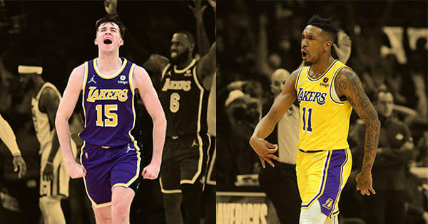 Los Angeles Lakers guards Austin Reaves and Malik Monk celebrating
