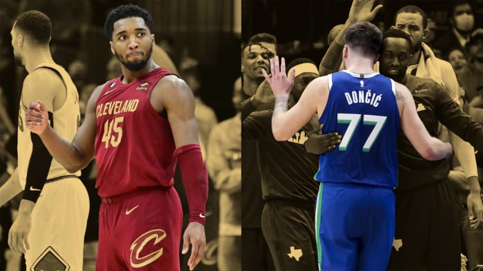 Cleveland Cavaliers guard Donovan Mitchell and Dallas Mavericks forward Luka Doncic celebrate after historic performance