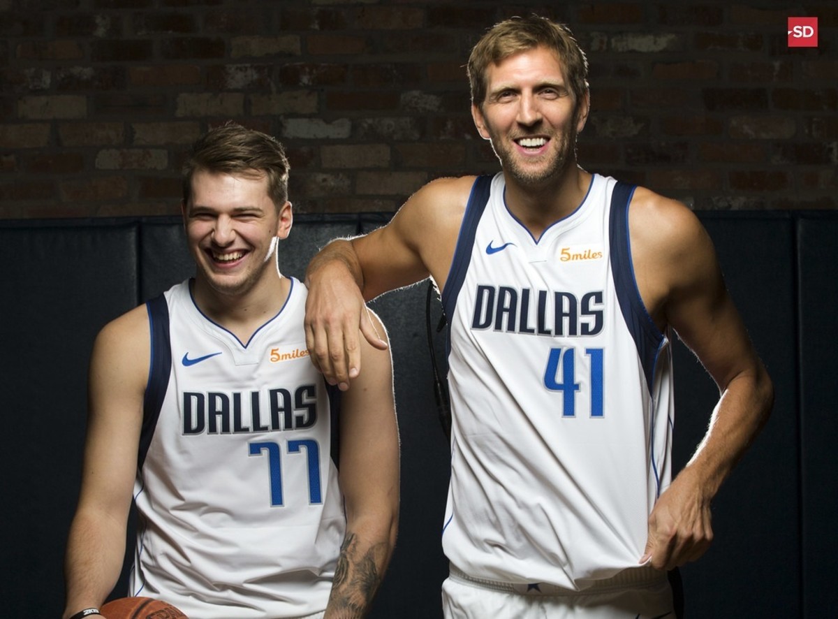 Dallas Mavericks Luka Doncic (left) and Dirk Nowitzki poses for a photo during Dallas Mavericks Media Day at the American Airlines Center in Dallas, Friday, September  21, 2018. (Tom Fox/The Dallas Morning News)