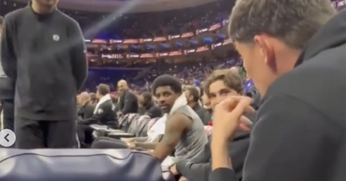 Kyrie Irving confronts a heckler during the game