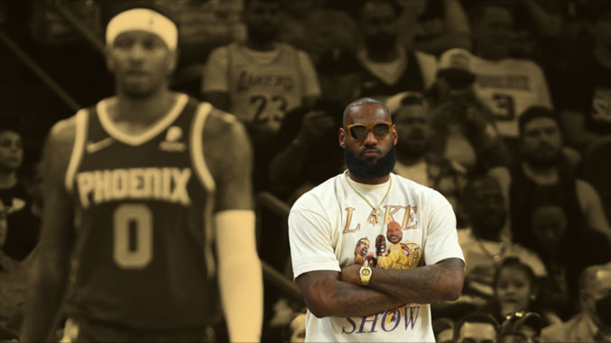 Los Angeles Lakers injured forward LeBron James watches from the bench