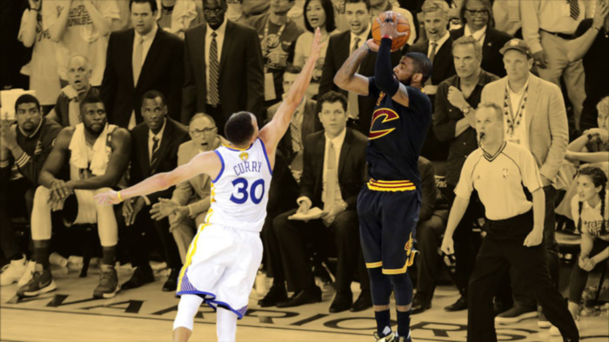 Cleveland Cavaliers guard Kyrie Irving shoots the the game winning shot during the fourth quarter against Golden State Warriors guard Stephen Curry