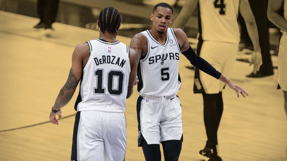 March 10, 2021;San Antonio Spurs forward DeMar DeRozan and guard Dejounte Murray during the game against the Dallas Mavericks at the American Airlines Center