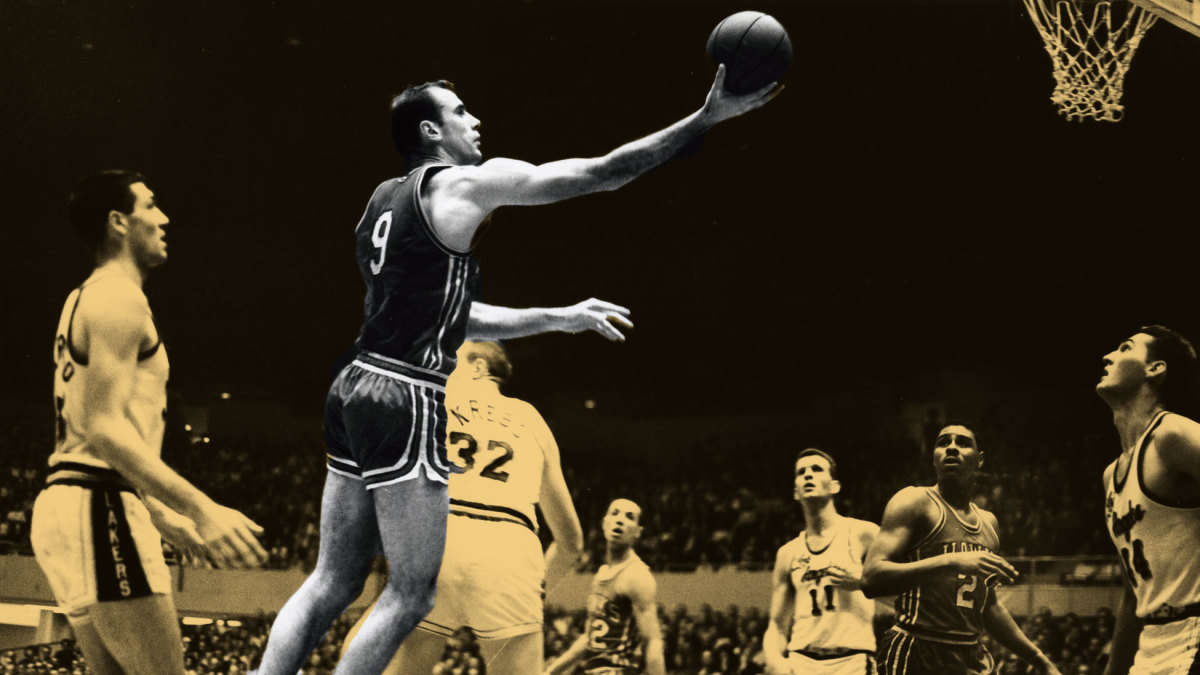 ; St. Louis Hawks forward Bob Pettit (9) lays the ball in against the Los Angeles Lakers during game 6 of the 1961 Western Division championship at the Los Angeles Sports Arena