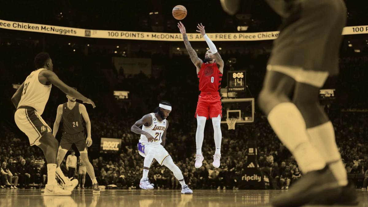 January 22, 2023; Portland Trail Blazers point guard Damian Lillard shoots the ball against Los Angeles Lakers point guard Patrick Beverley at Moda Center