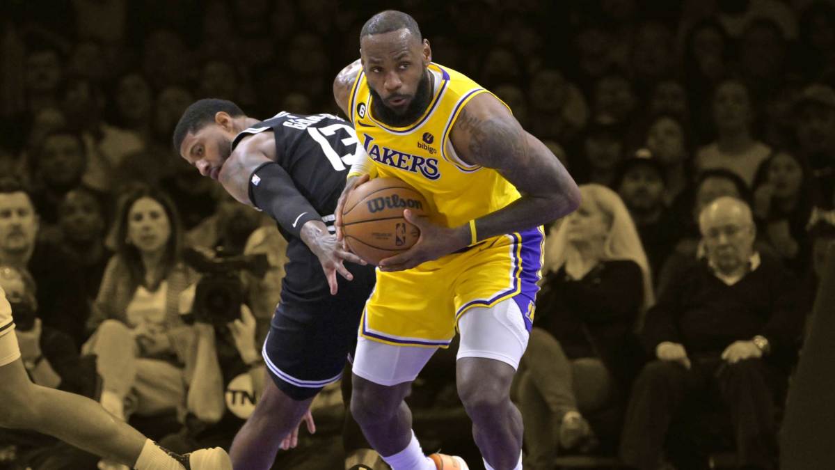 January 24, 2023; Los Angeles Lakers superstar LeBron James steals the ball from Los Angeles Clippers guard Paul George during the game at Crypto.com Arena