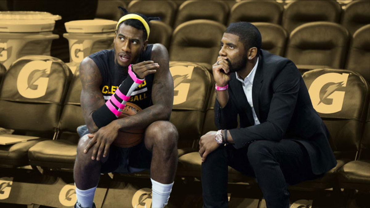 Cleveland Cavaliers guards Iman Shumpert and Kyrie Irving