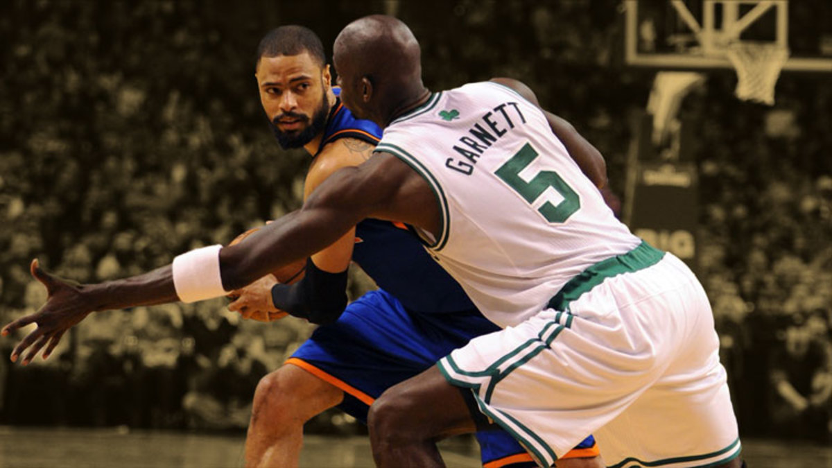 Boston Celtics forward Kevin Garnett guards New York Knicks center Tyson Chandler