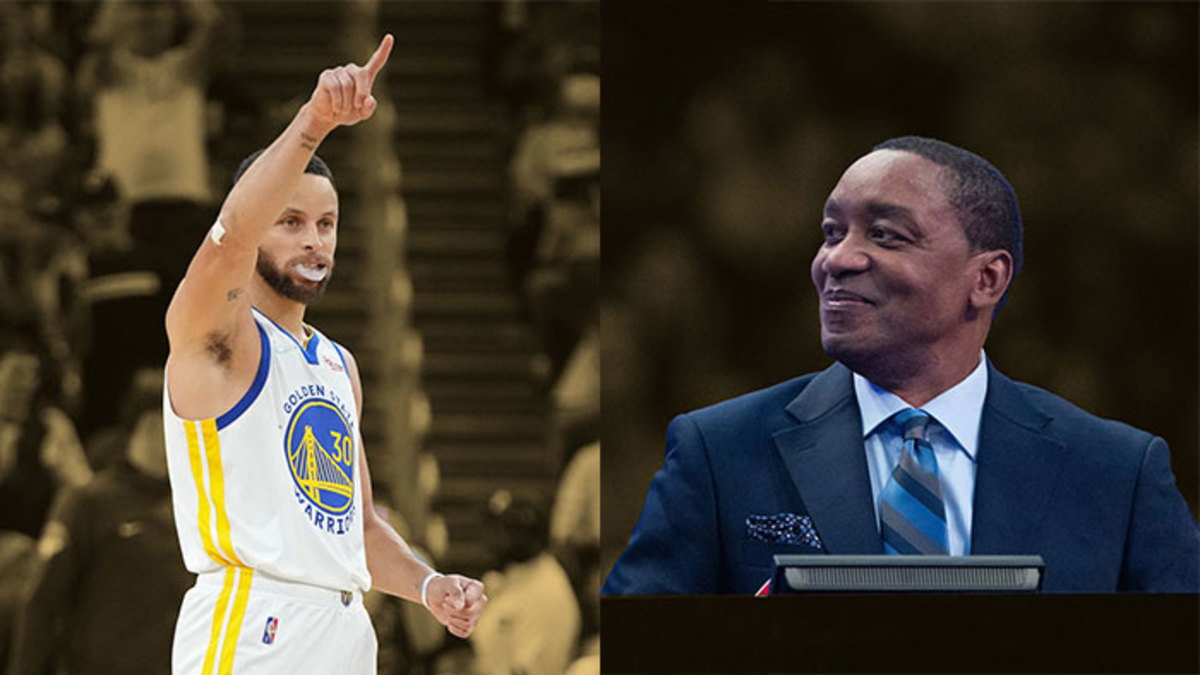 Golden State Warriors guard Stephen Curry and NBA great Isiah Thomas