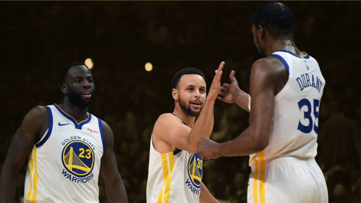 Golden State Warriors forward Draymond Green, guard Stephen Curry and forward Kevin Durant