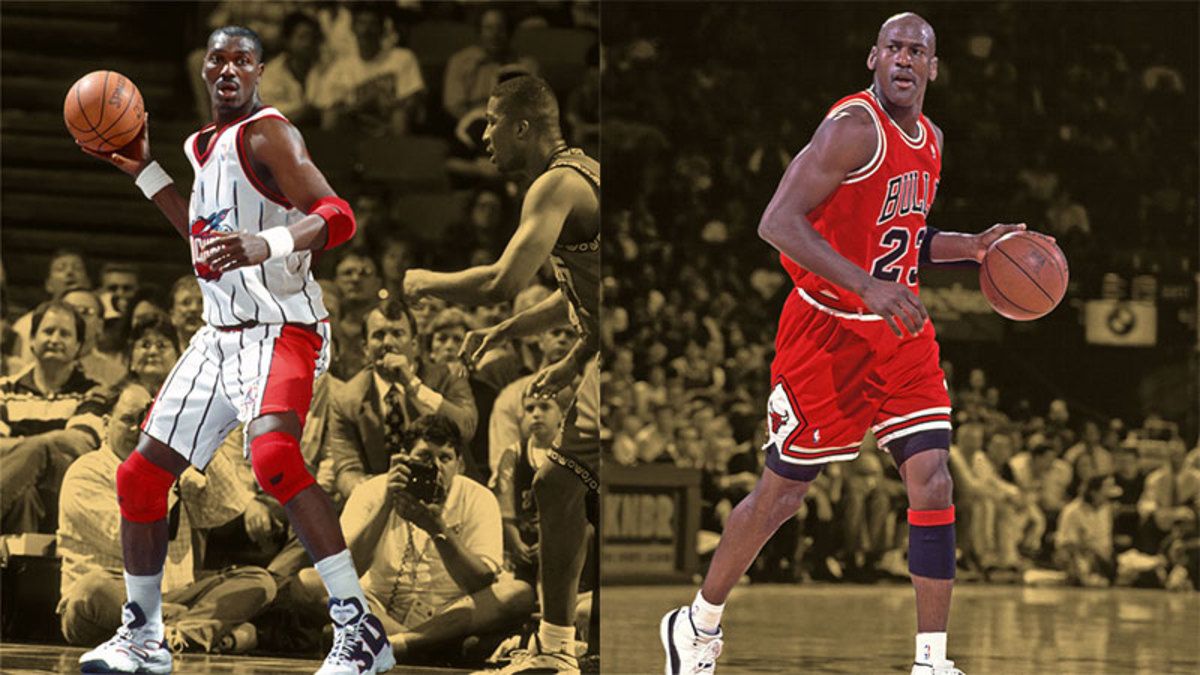 Houston Rockets center Hakeem Olajuwon and Chicago Bulls guard Michael Jordan