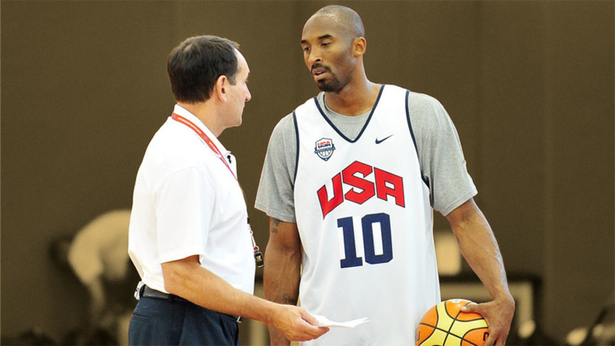 Team USA head coach Mike Krzyzewski speaks with guard Kobe Bryant