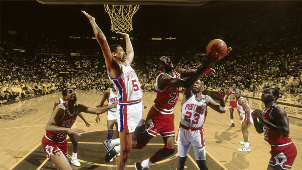 Chicago Bulls guard Michael Jordan is defended by Detroit Pistons center James Edwards