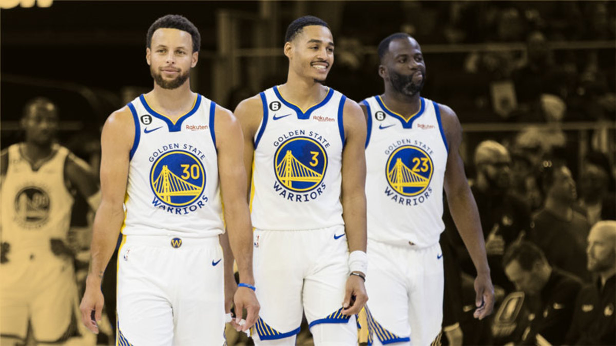 Golden State Warriors guard Jordan Poole, guard Stephen Curry, and forward Draymond Gree