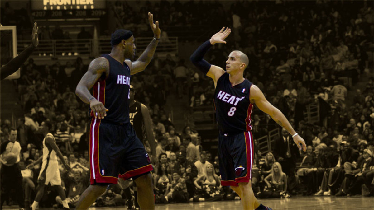 Miami Heat forward LeBron James and guard Carlos Arroyo