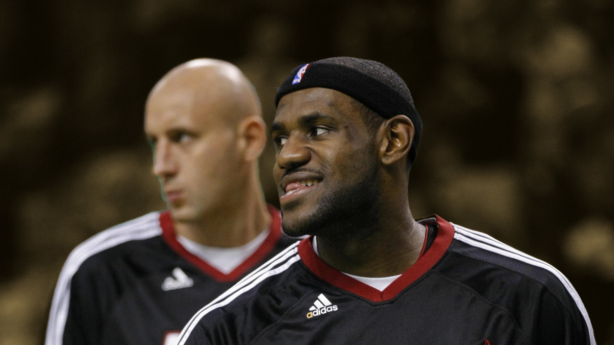 2010 Miami Heat teammates forward LeBron James and center Zydrunas Ilgauskas warm up before the start of the game against the Boston Celtics at the TD Garden.